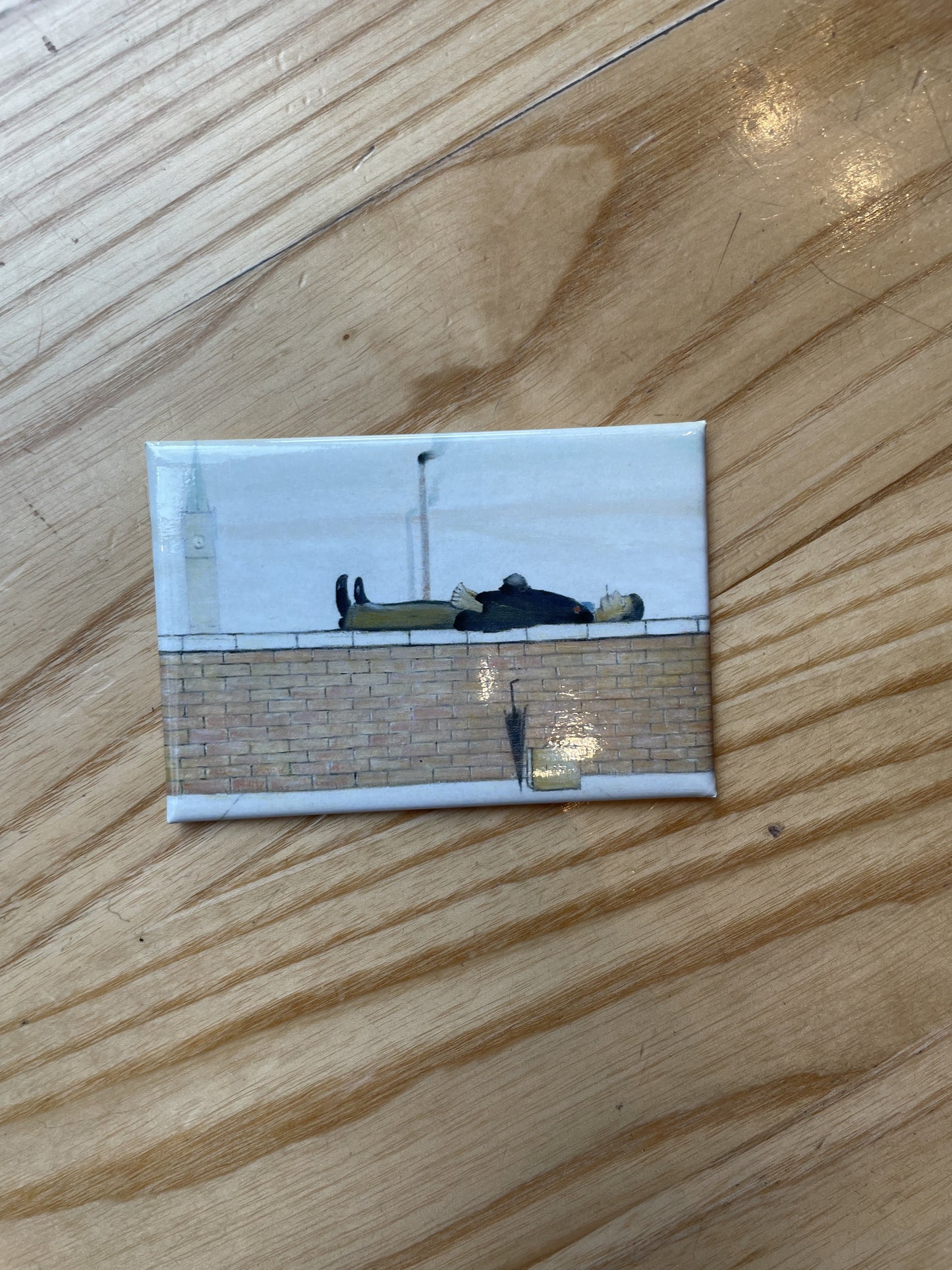 LOWRY Magnet Man Lying on a Wall